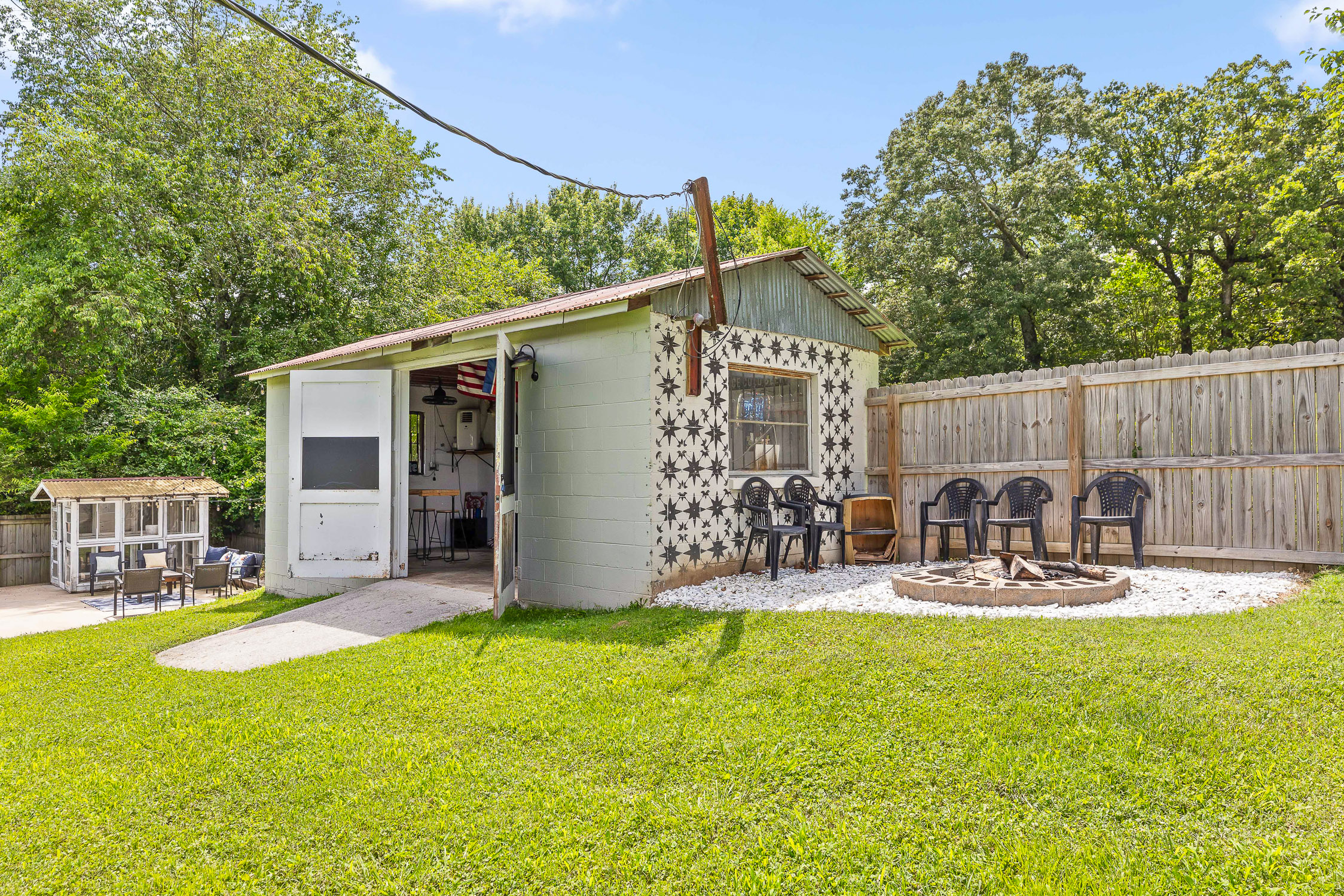 Rustic greenhouse and workshop building